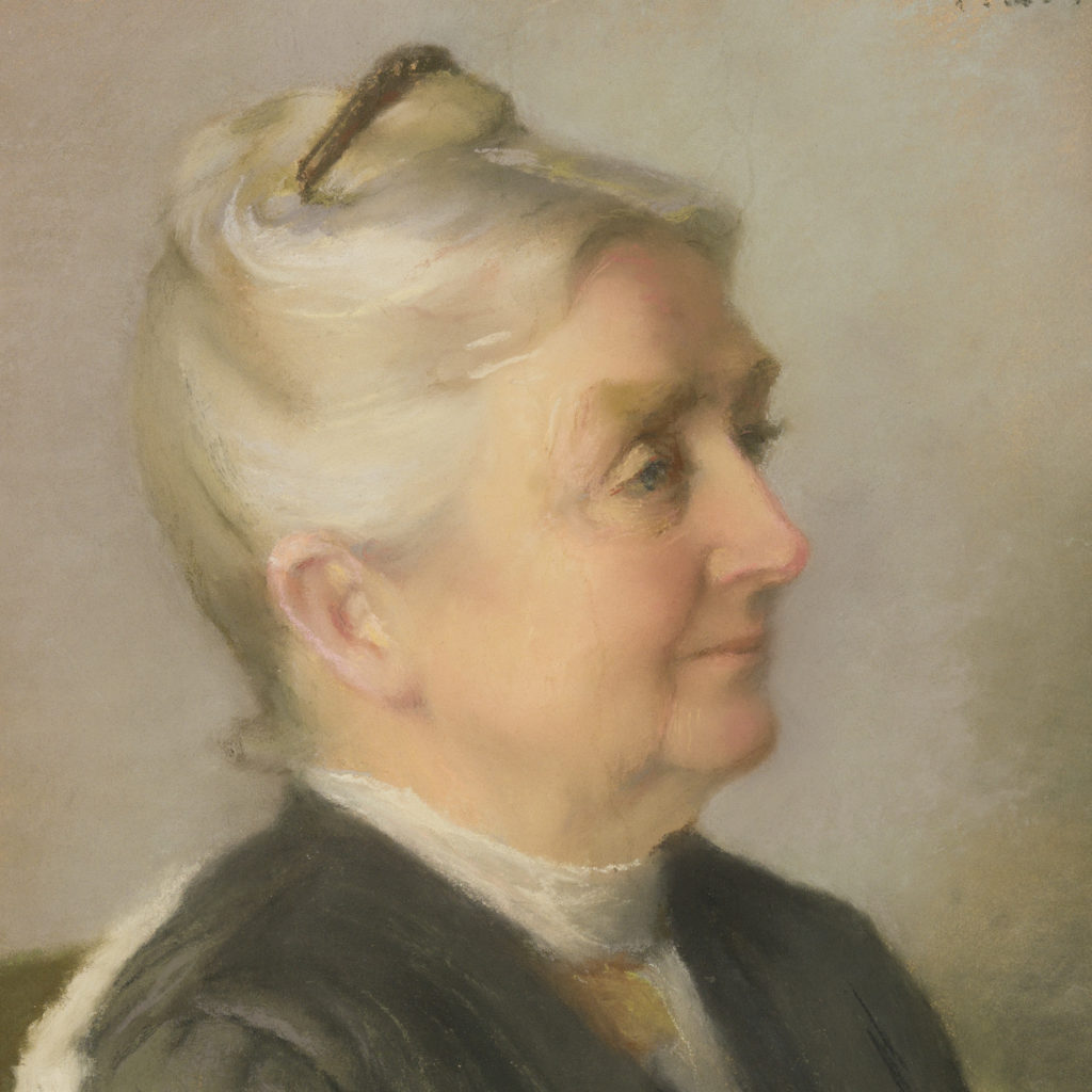 Painted portrait of an older white woman in large gold frame